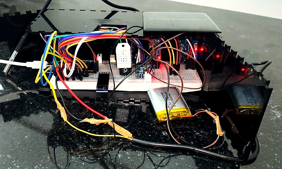 Our working prototype from the front, with sensors, OLED and battery visible