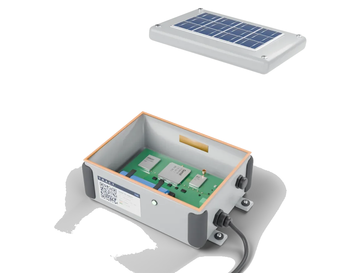 The Tag with its lid lifted, showing the board, battery and silica gel